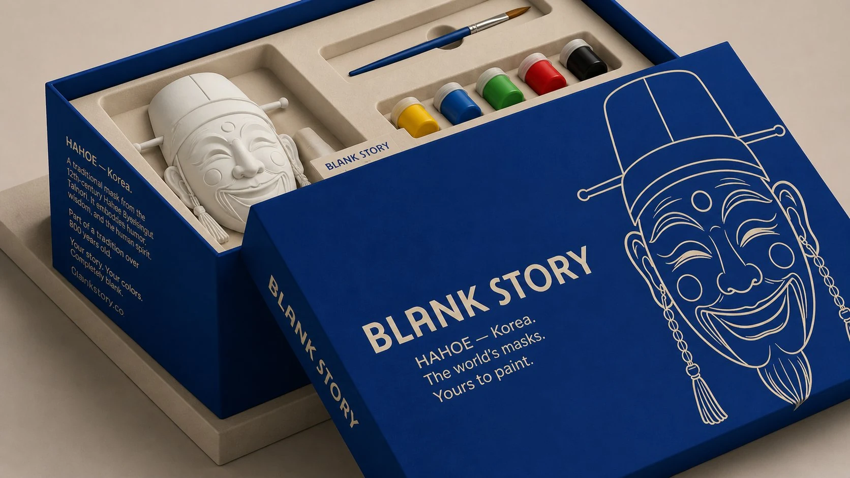 Hahoe BLANK Story mask painting kit, blue box open showing white plaster Korean nobleman mask, five paint pots, and brush